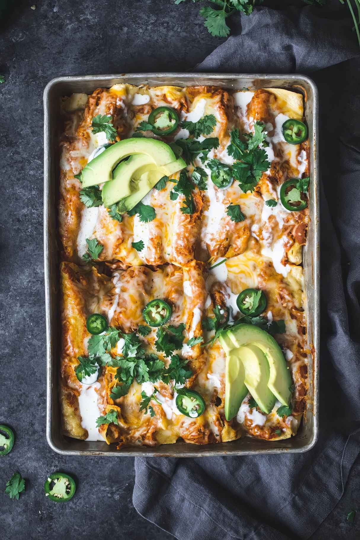 Spicy Black Bean Chicken Enchiladas with Pumpkin Sour Cream Sauce for Weeknight Fall Dinner