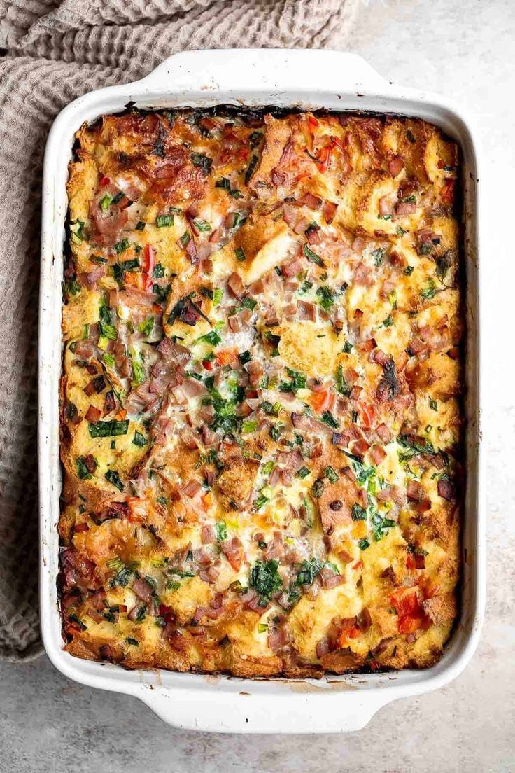 Breakfast Strata With Bread, Eggs, Veggies, Ham And Cheese